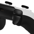 Close-up of a gaming controller with black and white design on a white background