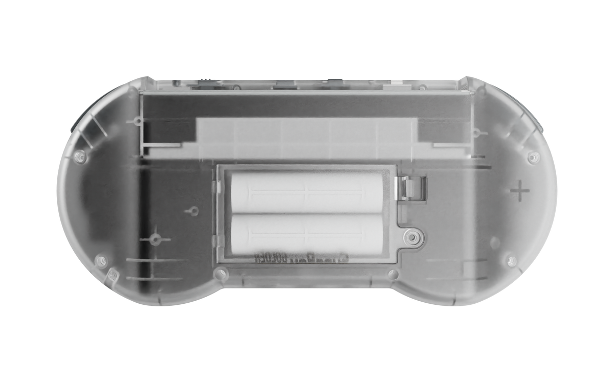 Back view of the translucent Hyperkin SupaBoy Prime portable console showing the internal battery compartment