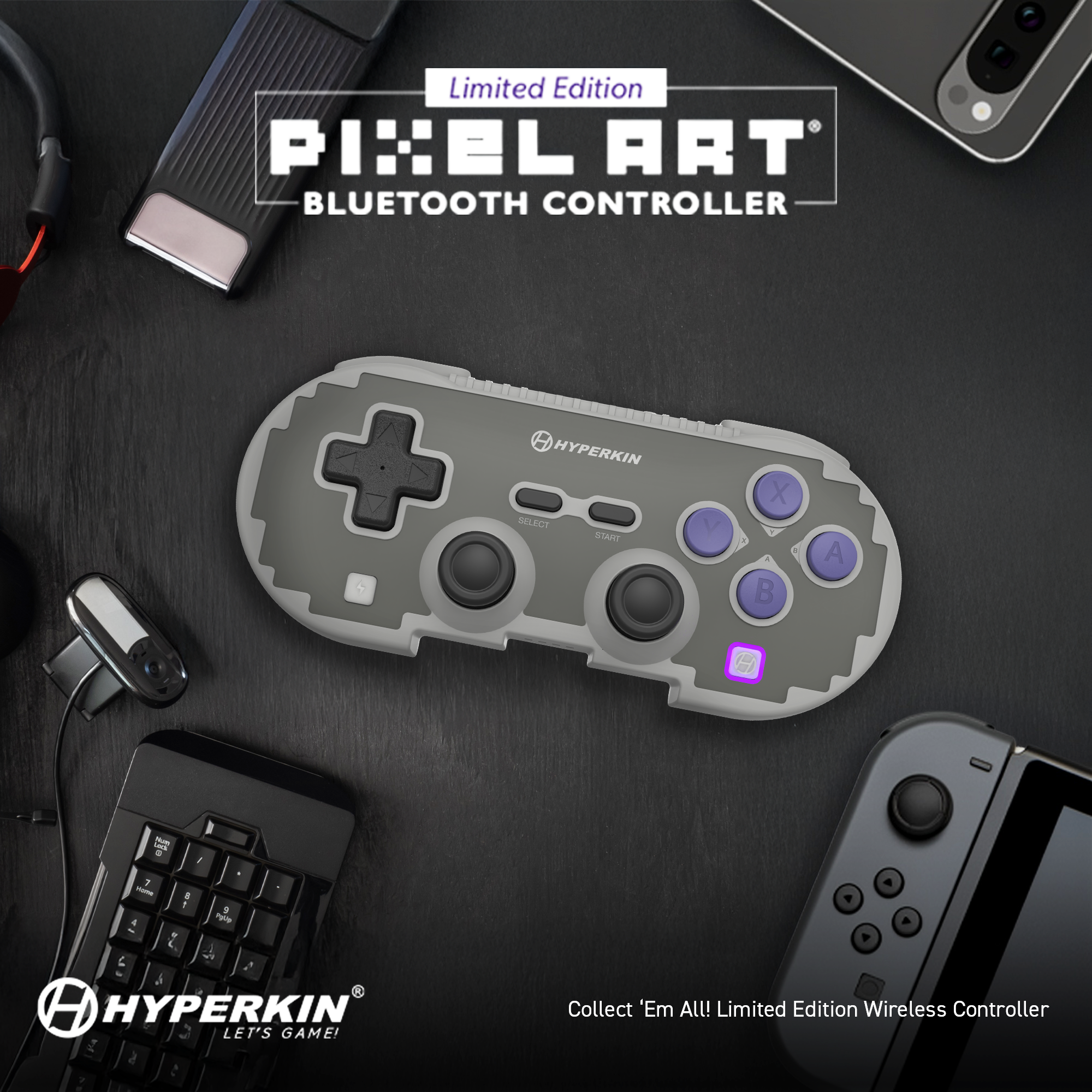 Pixel Art Bluetooth Controller by Hyperkin on a dark surface with gaming accessories.