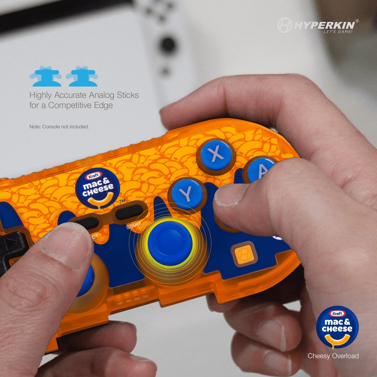 Close-up of Hyperkin Kraft Mac & Cheese-themed gaming controller in orange and blue, featuring accurate analog sticks and Kraft Mac & Cheese branding.