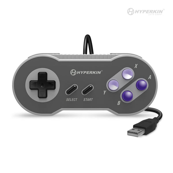 A gray Hyperkin 'Scout' Premium SNESÂ®-Style USB Controller with a wired connection and purple buttons.