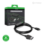 The image shows a black Panorama HD Cable for Original Xbox with its packaging, which has green accents and the Xbox logo.