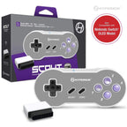Hyperkin Scout Premium Wireless Controller compatible with Super NES, PC, Mac, Android, Nintendo Switch, Switch Lite, and Switch OLED; shown in front of retail packaging.
