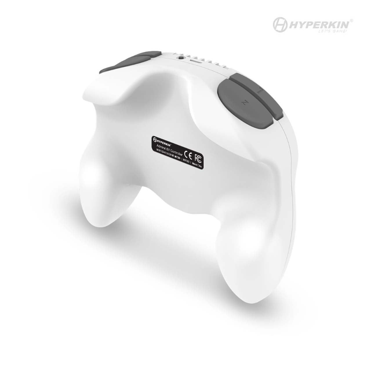 White Hyperkin gaming controller with ergonomic grips and dual top-mounted black buttons, featuring CE and FCC regulatory markings on the back.